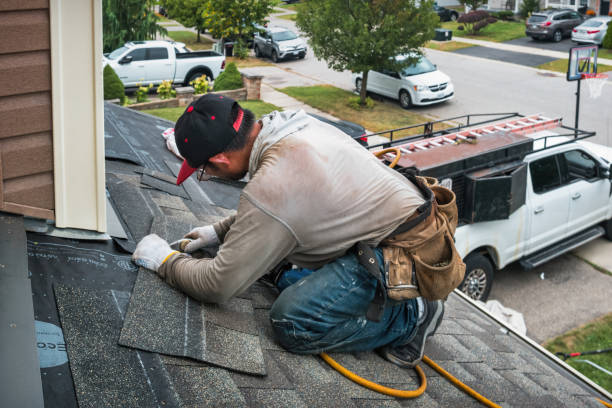 Professional Roofing technician working in Yawkey, WV